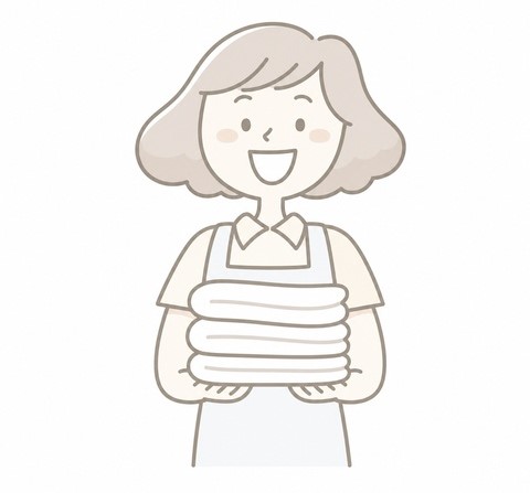 タオルを持つ女性